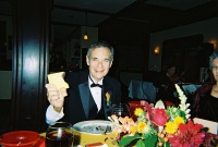 J toasts his place card.jpg